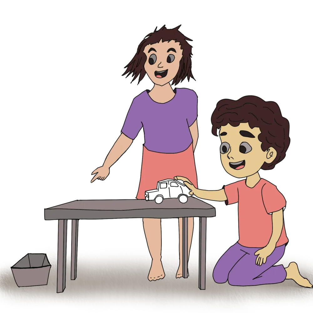 A child rolling a toy car off a table to watch the path it takes as it falls